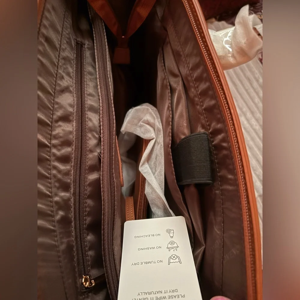 Elegant Tan faux leather Tote Bag Never used . Great for business and travel -
